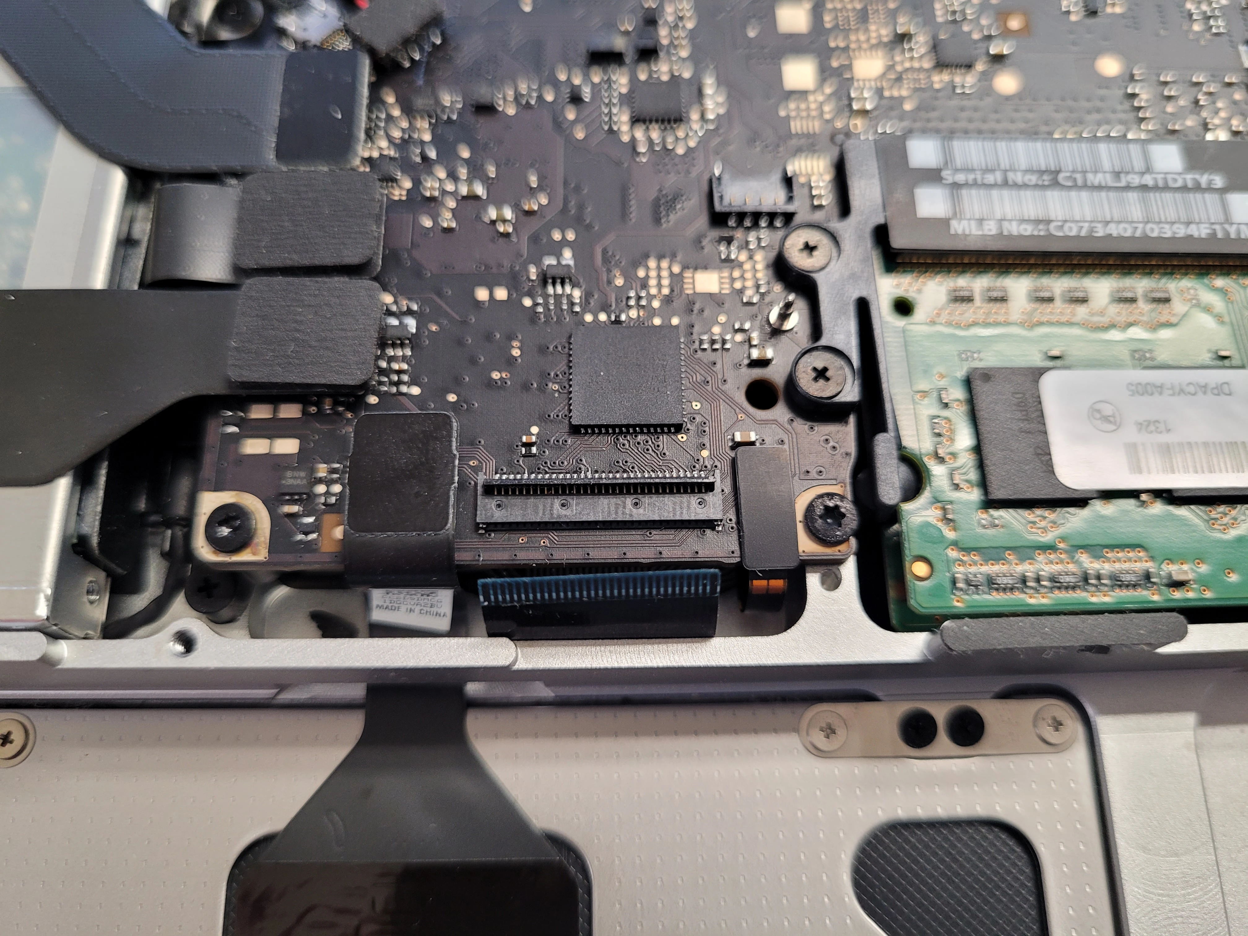 Step 10 - MacBook Pro Unibody model A1278 Logic Board replacement