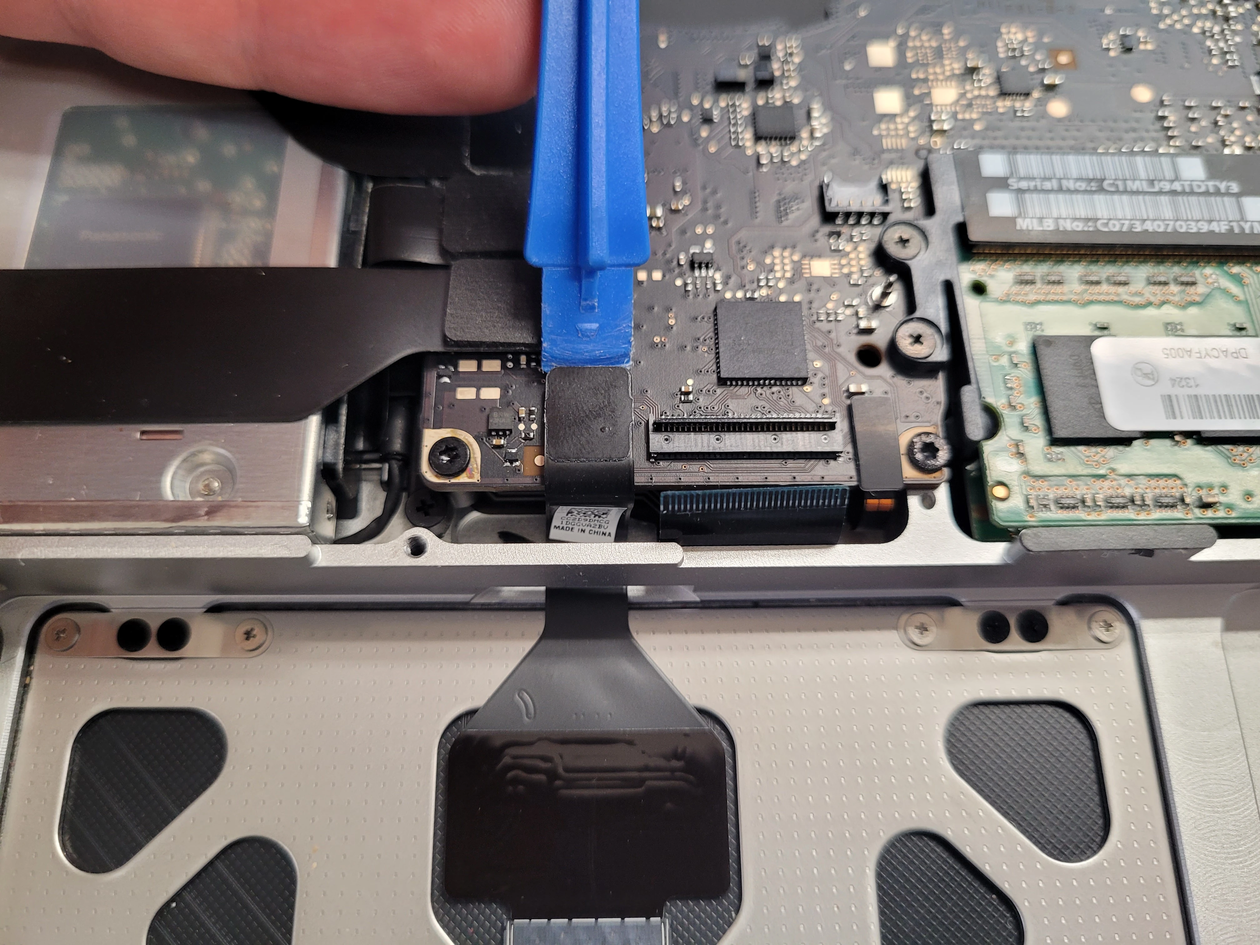 Step 11 - MacBook Pro Unibody model A1278 Logic Board replacement